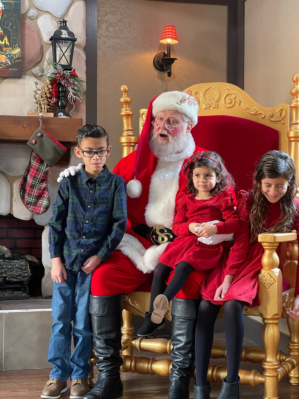 Family taking Santa photos at Citadel Outlets, Southern California